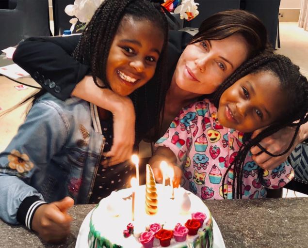 Charlize Theron with her daughters