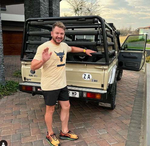 Malcolm with his car